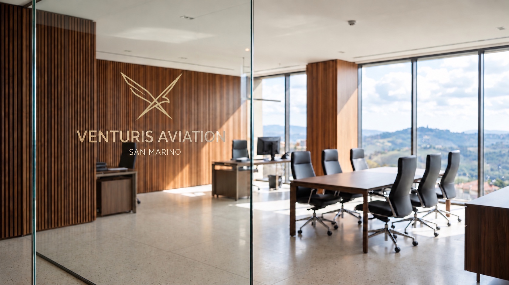 Venturis Aviation office with the company name on the fixed glass meeting room partition